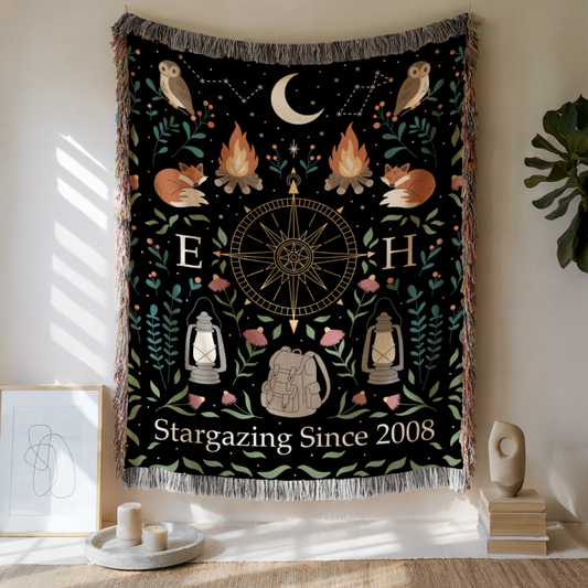 Decorative tapestry with stargazing design hanging on a wall.