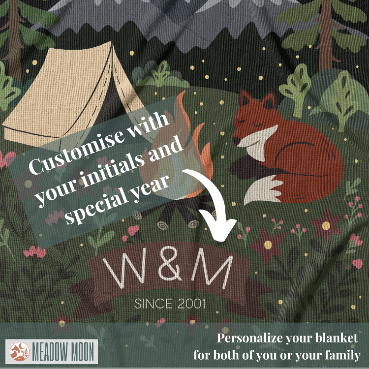 Blanket with camping design, fox, and text for personalization.